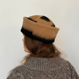 Beige and black sailor hat