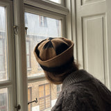 Beige and black sailor hat